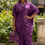 Purple satin African dress for women styled for Nigerian party fashion
