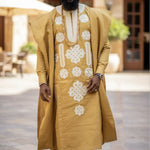 Front view of Oladele Gold and Cream Embroidered African Aso Oke Agbada Robe for men.