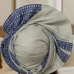 Intricate fan-like design of the Olawi Aso Oke Autogele Hat.