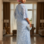 Light blue lace dress paired with accessories for a trendy look, stylishly showcasing Africa's fashion heritage.