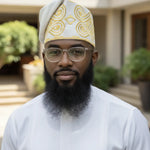 Osho white handwoven Aso Oke Yoruba fila hat with gold patterns by Dupsie’s African Fashion, premium African hat for men and African fashion for men.