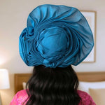 Detailed texture of the pre-tied Aso Oke Autogele hat showcasing its jean-like fabric
