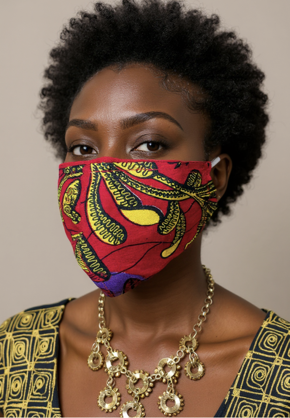 Unisex purple yellow red Ankara cotton face mask (Okafor) from Dupsie’s African Fashion, featuring side pockets for filters
