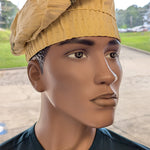 Handwoven Beige with Green African Aso Oke kufi cap hat – traditional Yoruba brimless fila hat in African clothing fashion by Dupsie’s 