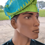 Handwoven African Aso Oke kufi cap in green and blue patterns – 5 inch tall brimless Yoruba hat 