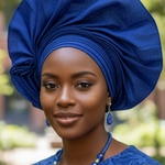 Front view of a royal blue Aso Oke Autogele crown hat, pre-tied gele with rhinestones on a denim-like fabric.