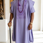 Semajj light purple African Agbada for men by Dupsie’s African Fashion with deep purple embroidery and matching Buba Sokoto set.