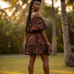 Detailed view of the smocked elastic waist skirt in African print