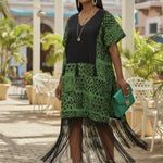 Tessa dress by Dupsie's featuring green and black Ankara print.