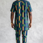 Close-up of Vayo men's cotton Dashiki shirt showing its geometric African-inspired print, decorative front placket and chest pocket.